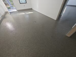 Garage Flooring 1300 sq ft of Tennessee Flake on this garage and apartment floor-min