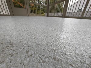 residential concrete coating Swan Flake over plywood base on this screened in porch in Sanford, Maine by Epoxy Pros of New England-min